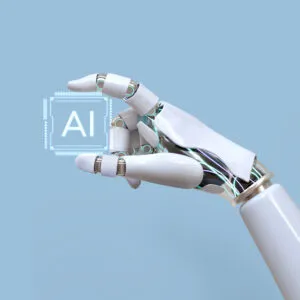 Uma mão robótica segurando um ícone digital com as letras "AI"
